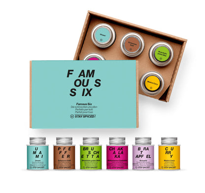 Die geöffnete Famous Six Geschenkbox von STAY SPICED ! präsentiert sechs Premium-Gewürze für Gourmets