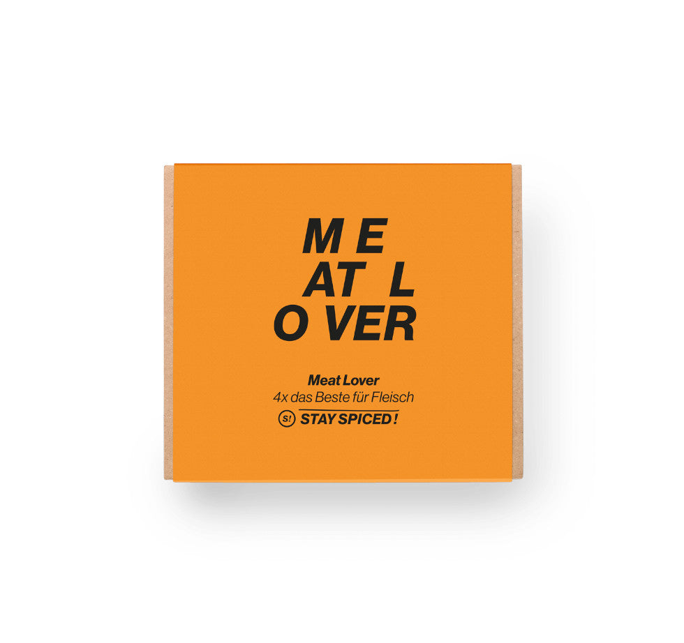Die edel gestaltete, orangefarbene Meat Lover Geschenkbox als perfektes Präsent für Grill- und Fleischfans