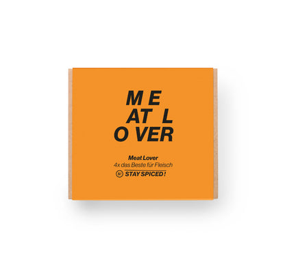 Die edel gestaltete, orangefarbene Meat Lover Geschenkbox als perfektes Präsent für Grill- und Fleischfans