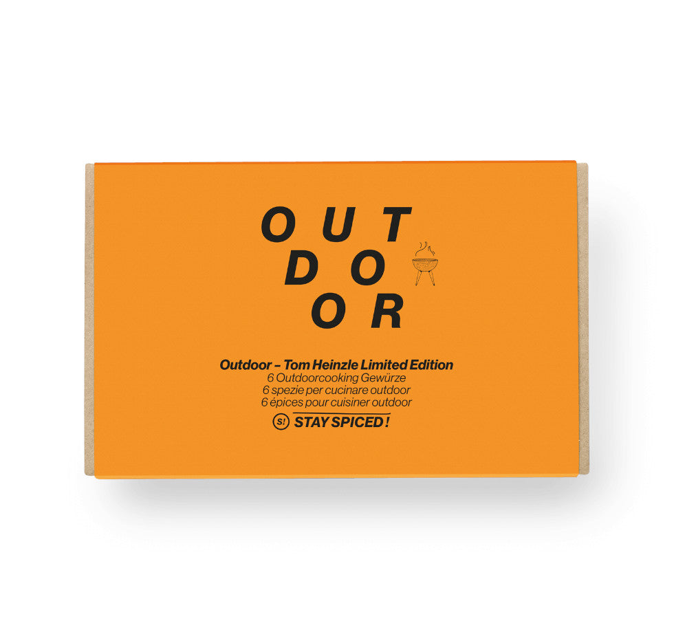 Geschlossene orange STAY SPICED ! OUTDOOR Geschenkbox von Tom Heinzle für ambitionierte Grillmeister